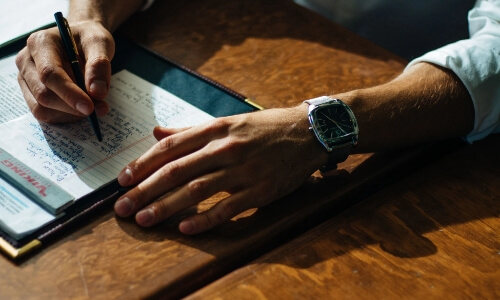 A man taking notes