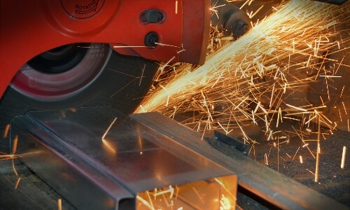 A part being cut by a welder